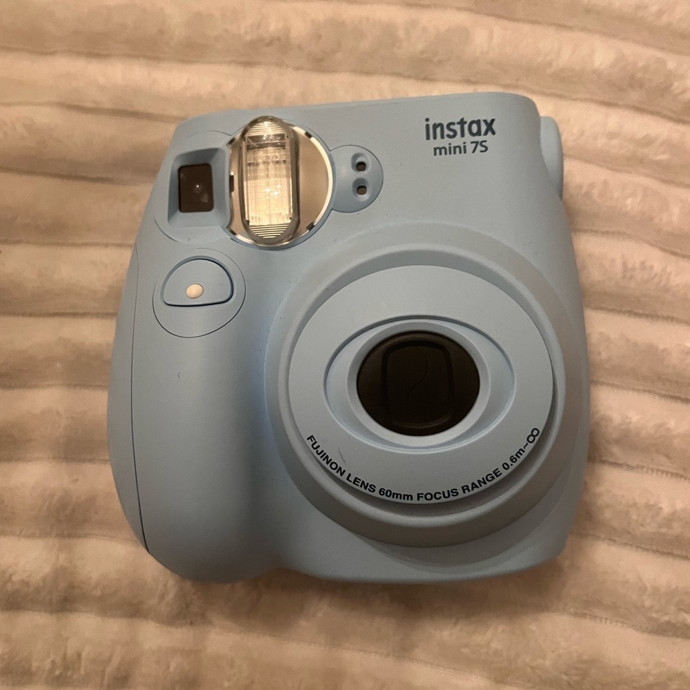 Baby blue Polaroid camera